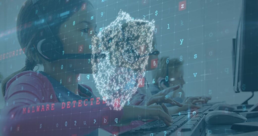 A young person at school wearing a headset uses a computer, overlaid with a digital matrix of numbers and a shield icon.