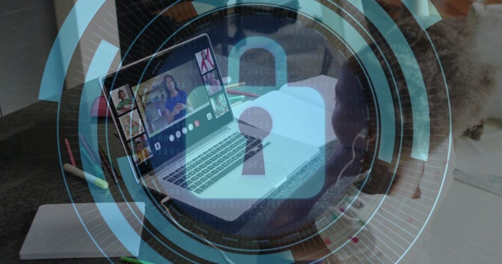 A laptop showing a video call with multiple participants is overlaid by a digital padlock for IT security